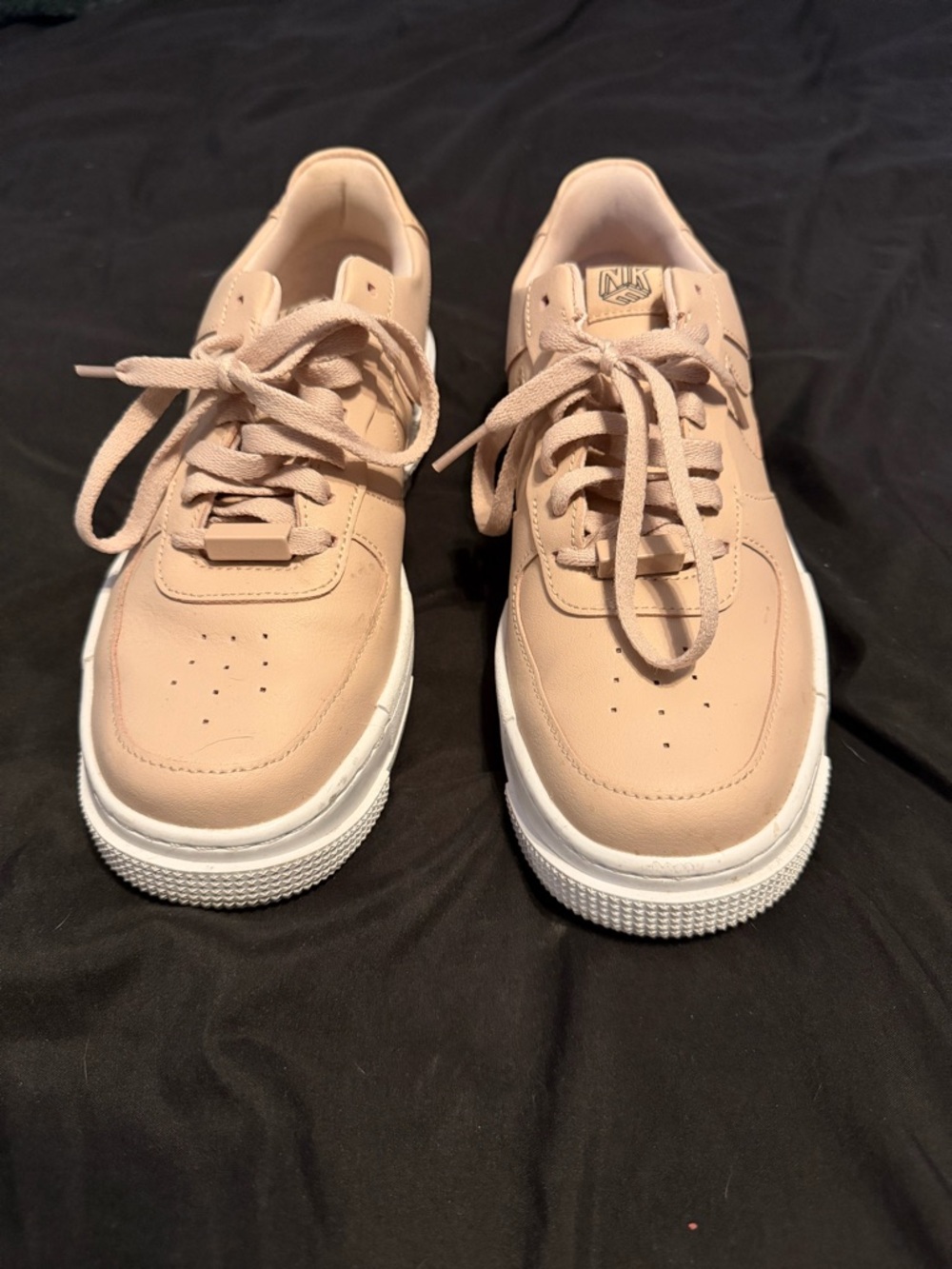 Nike pink and white Air Force ones